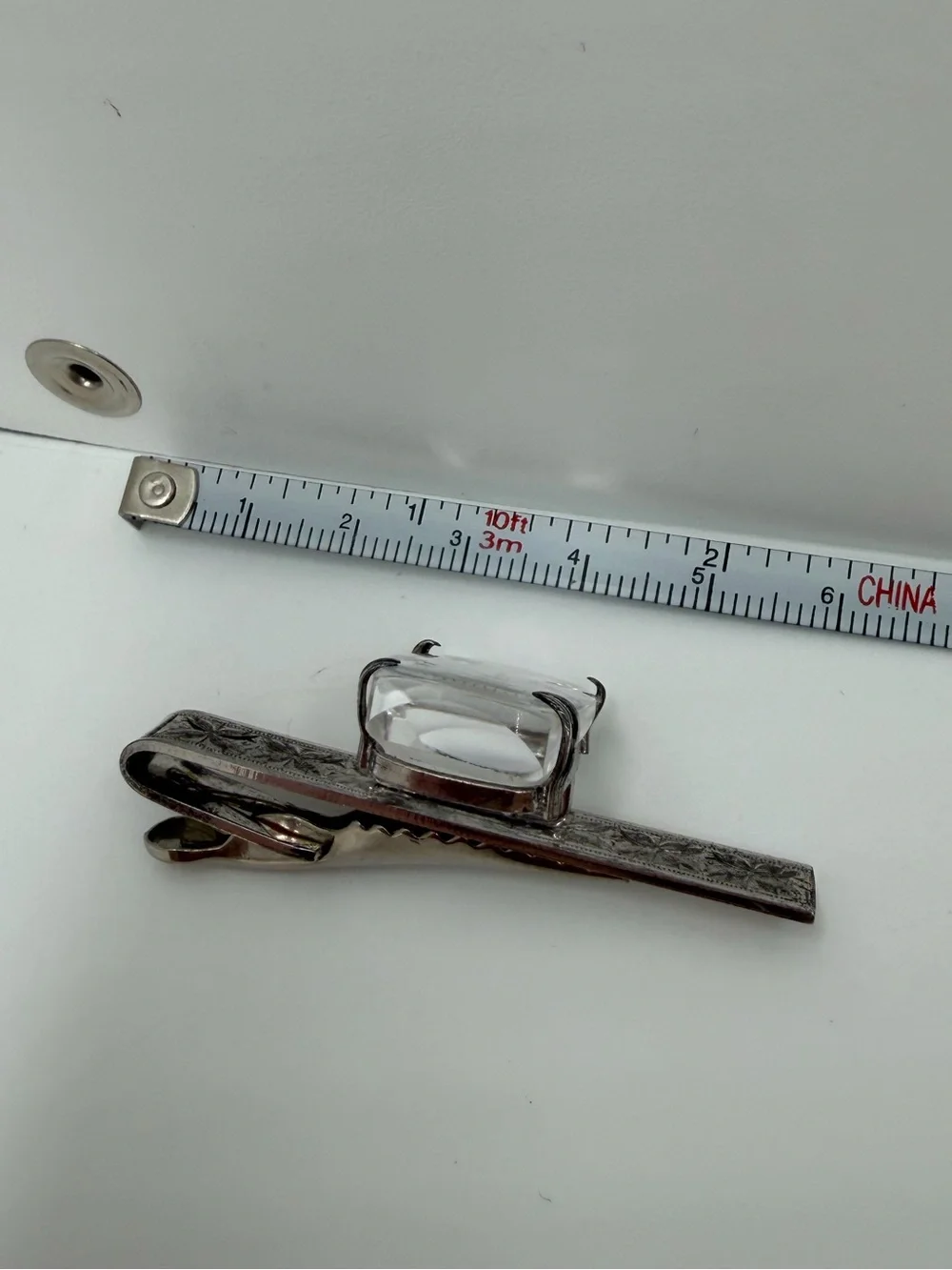 Silver tone Japan reverse carved tie clip